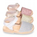 Shiny soft leather kids menorquina sandals with hook and loop strap.