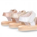 Shiny soft leather kids menorquina sandals with hook and loop strap.