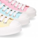 Cotton canvas Sneaker shoes with shoelaces and with toe cap in pastel colors.