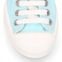 Zapatilla niños CASUAL con puntera y cordones en colores pasteles.
