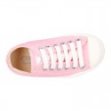 Cotton canvas Sneaker shoes with shoelaces and with toe cap in pastel colors.