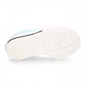 Zapatilla niños CASUAL con puntera y cordones en colores pasteles.