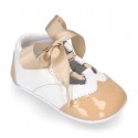 English style shoes in combined patent leather for babies.