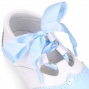 English style shoes in combined patent leather for babies.