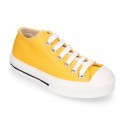 Cotton canvas OKAA Sneaker shoes with shoelaces and with toe cap in trendy colors.