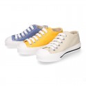 Cotton canvas OKAA Sneaker shoes with shoelaces and with toe cap in trendy colors.