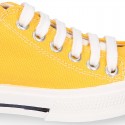 Cotton canvas OKAA Sneaker shoes with shoelaces and with toe cap in trendy colors.