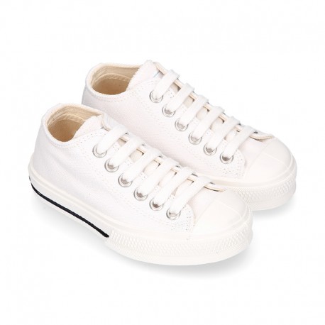 White Cotton canvas OKAA Sneaker shoes with shoelaces and toe cap.