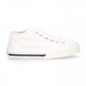 White Cotton canvas OKAA Sneaker shoes with shoelaces and toe cap.