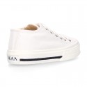 White Cotton canvas OKAA Sneaker shoes with shoelaces and toe cap.