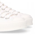 White Cotton canvas OKAA Sneaker shoes with shoelaces and toe cap.