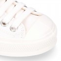 White Cotton canvas OKAA Sneaker shoes with shoelaces and toe cap.