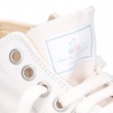 White Cotton canvas OKAA Sneaker shoes with shoelaces and toe cap.