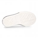 White Cotton canvas OKAA Sneaker shoes with shoelaces and toe cap.