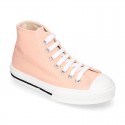 Cotton canvas High Sneaker shoes with shoelaces and with toe cap in pastel colors.