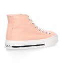 Cotton canvas High Sneaker shoes with shoelaces and with toe cap in pastel colors.