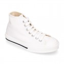 Cotton canvas High Sneaker shoes with shoelaces and with toe cap in pastel colors.