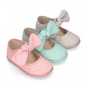 STARS print design canvas Little Mary Janes with hook and loop strap closure and bow.