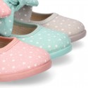 STARS print design canvas Little Mary Janes with hook and loop strap closure and bow.