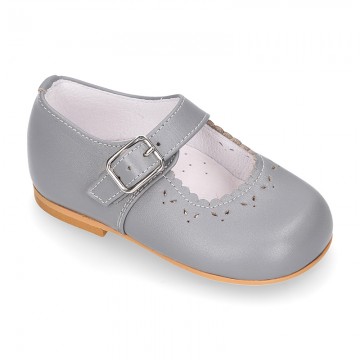 Classic Nappa leather little Mary Janes with chopped flower design.