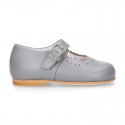 Classic Nappa leather little Mary Janes with chopped flower design.