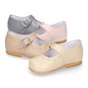 Classic Nappa leather little Mary Janes with chopped flower design.