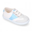 Combined cotton canvas kids tennis shoes with laces closure.