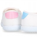 Combined cotton canvas kids tennis shoes with laces closure.