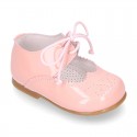 Little Mary jane shoes angel style in patent leather in pastel colors.