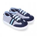 Combined Cotton canvas tennis shoes with ties closure.