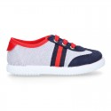 Combined Cotton canvas tennis shoes with ties closure.