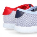 Combined Cotton canvas tennis shoes with ties closure.