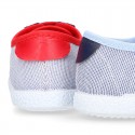 Combined Cotton canvas tennis shoes with ties closure.