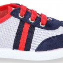 Combined Cotton canvas tennis shoes with ties closure.