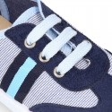 Combined Cotton canvas tennis shoes with ties closure.