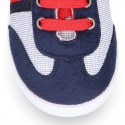 Combined Cotton canvas tennis shoes with ties closure.