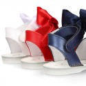 Shiny soft leather Menorquina sandals for baby girls and BOW.