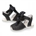 BLACK Shiny soft leather Menorquina sandals for baby girls and BOW.