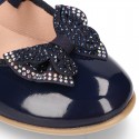 Girl´s PATENT finish ballet flats with STRASS BOW and elastic band.