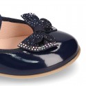 Girl´s PATENT finish ballet flats with STRASS BOW and elastic band.