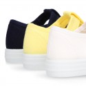 Cotton Canvas Little T-Bar shoes sneaker style with hook and loop strap.