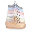 Classic little english style shoes in patent leather and soft colors.