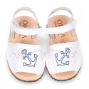 Embroidery leather Menorquina sandals with hook and loop strap.