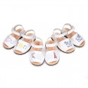 Embroidery leather Menorquina sandals with hook and loop strap.