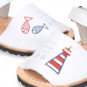 Embroidery leather Menorquina sandals with hook and loop strap.