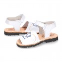 Embroidery leather Menorquina sandals with hook and loop strap.