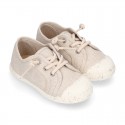 RECYCLED Canvas Kids Sneaker shoes laceless and with toe cap in soft colors.