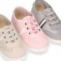 Tenis niños combinado en lona y cordones. Edición especial.