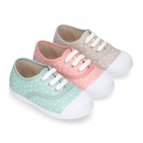 STARS print design cotton canvas Kids sneaker shoes with laces closure and toe cap.