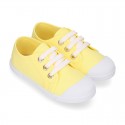 COTTON canvas Kids sneaker shoes with laces closure and toe cap.